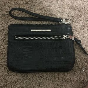 Black Steve Madden wristlet.